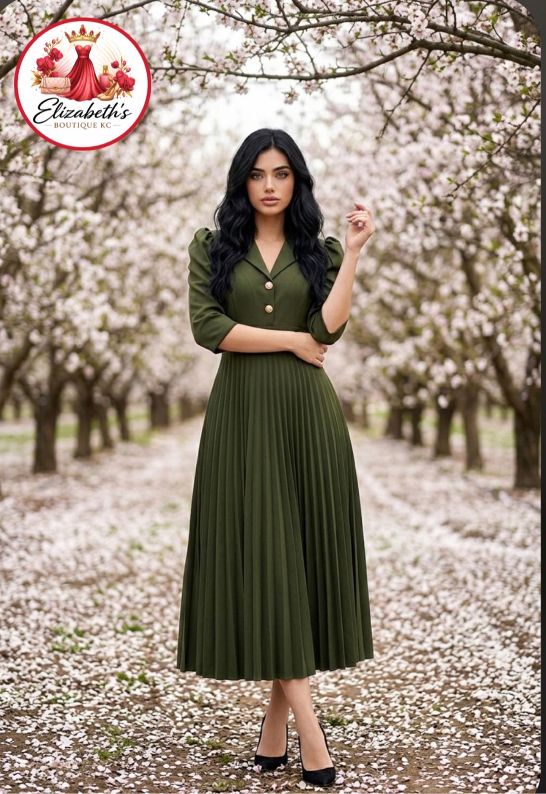 Modelo con vestido verde oliva entre cerezos en flor — Elizabeth's Boutique KC